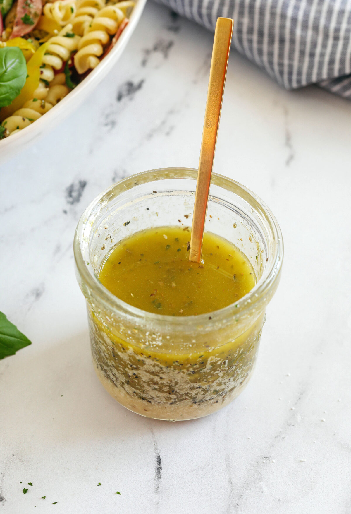 You'll love this zesty homemade Easy Italian Dressing made in just minutes with a few simple pantry ingredients!  Perfect for salads, veggies, marinades, and more!