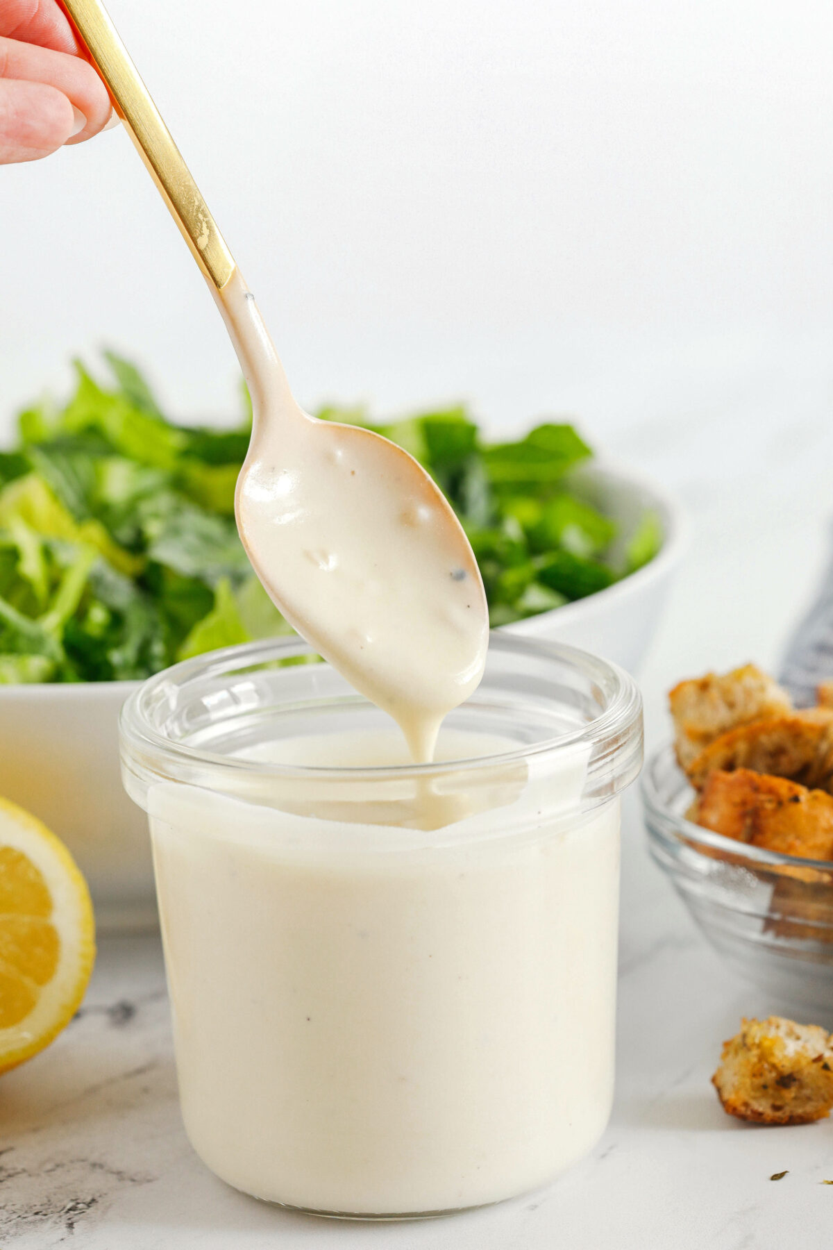 Rich and creamy Healthy Caesar Dressing made with protein-packed Greek yogurt for a lighter take on this classic dressing!  Homemade is always better than store-bought!