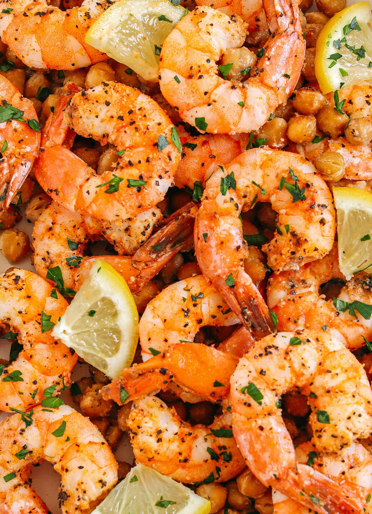 Flavorful Lemon Garlic Shrimp with Chickpeas easily made in under 30 minutes all on one pan with just a few simple ingredients!  Perfect as an appetizer, on top of a salad or even as a main dish!