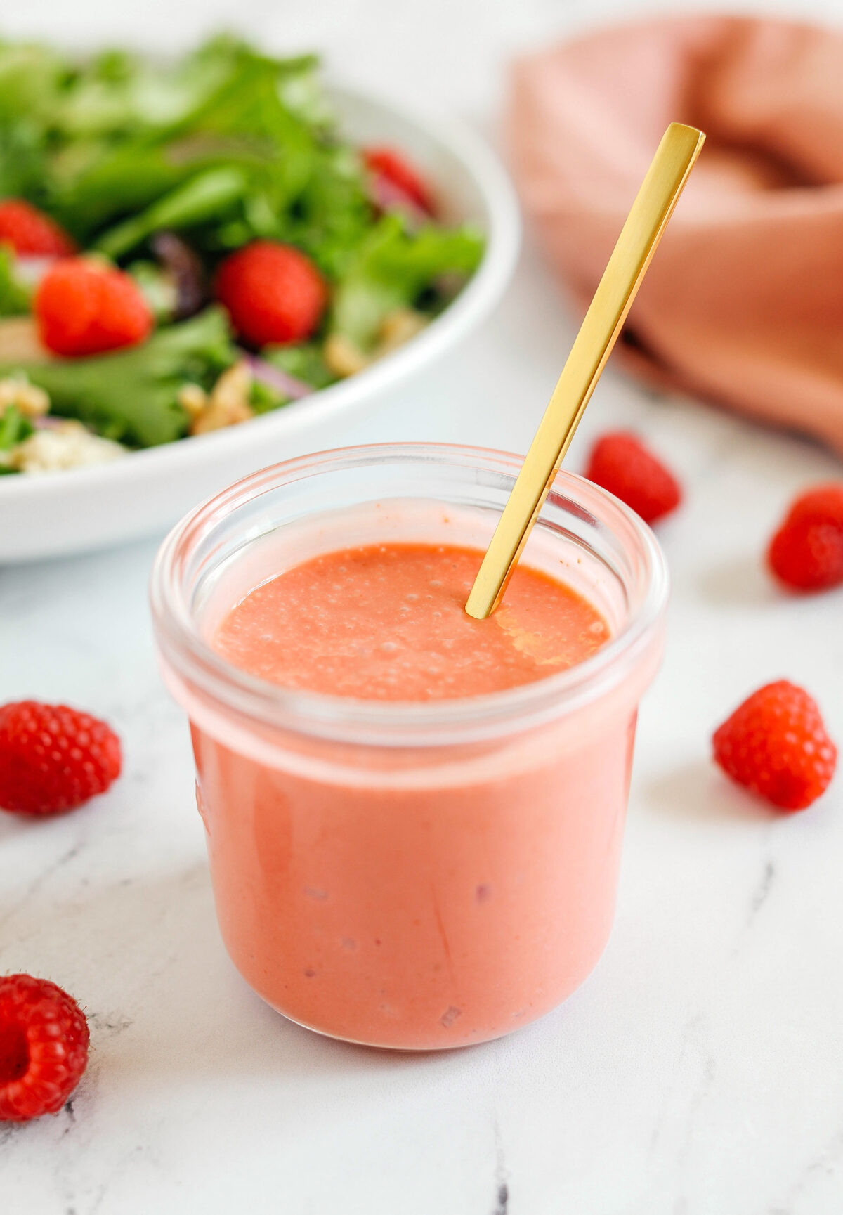 This Easy Raspberry Vinaigrette is a sweet and tangy homemade dressing that comes together in just 5 minutes!  Tastes so much better than store-bought dressings! 